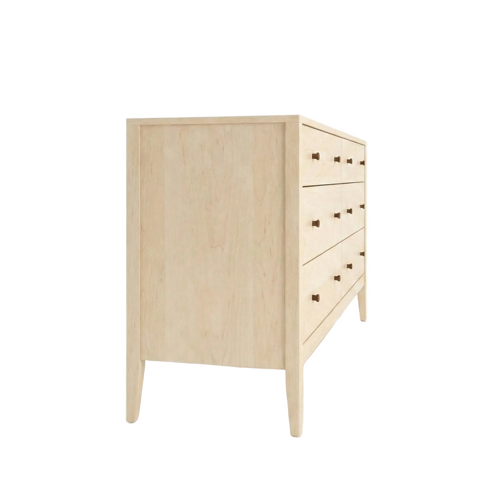 Side view of a solid wood, hard maple, Vermont-made dresser with black knobs. 