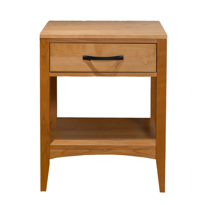 A Solid Cherry wooden one-drawer nightstand with a sleek black handle and a lower shelf. A modern traditional marvel. 